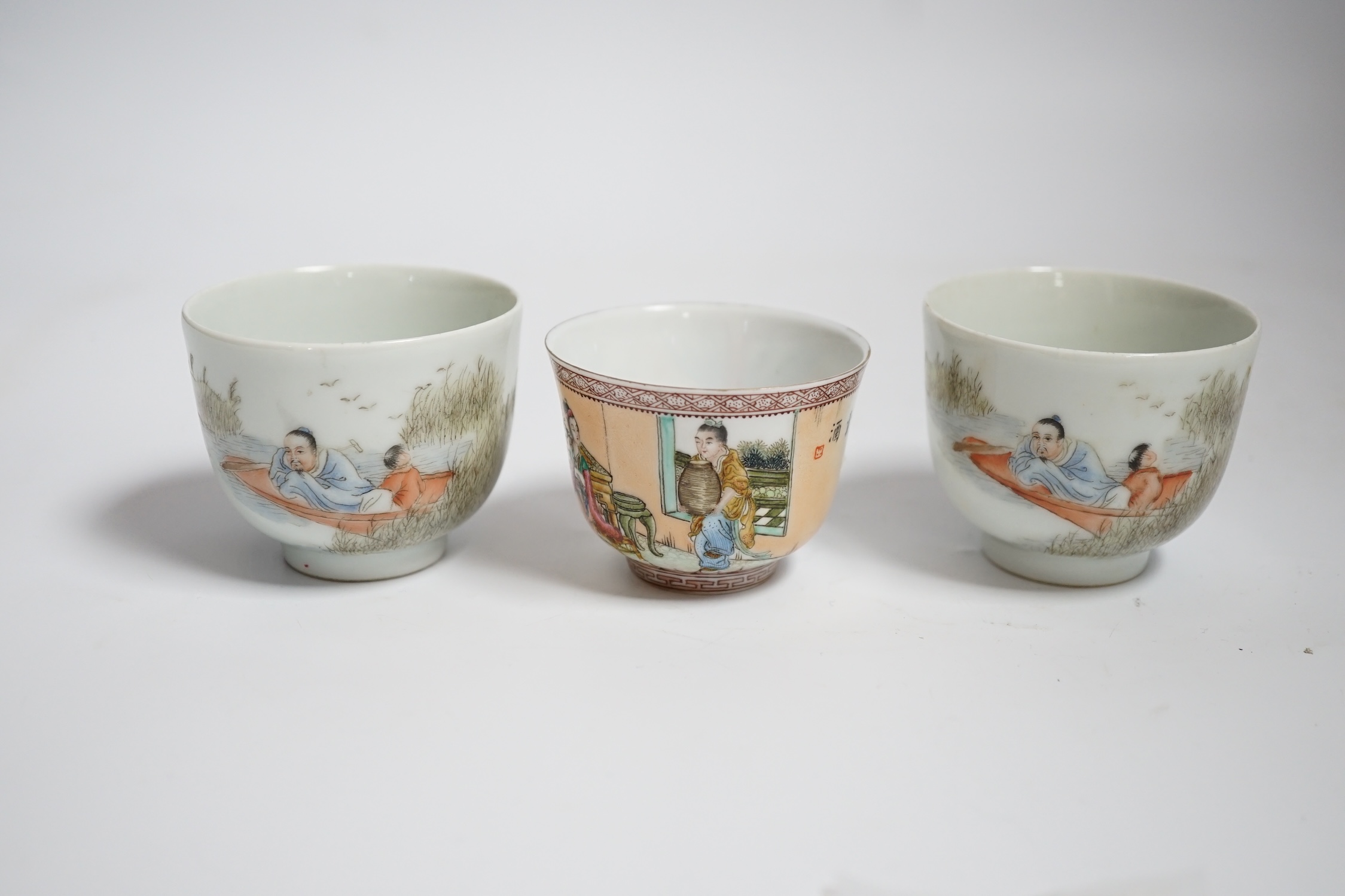Three Chinese enamelled porcelain tea bowls, largest 5cm high